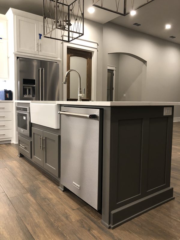 Custom laundry and mudroom cabinetry by Custom Wordworks in Longview, TX