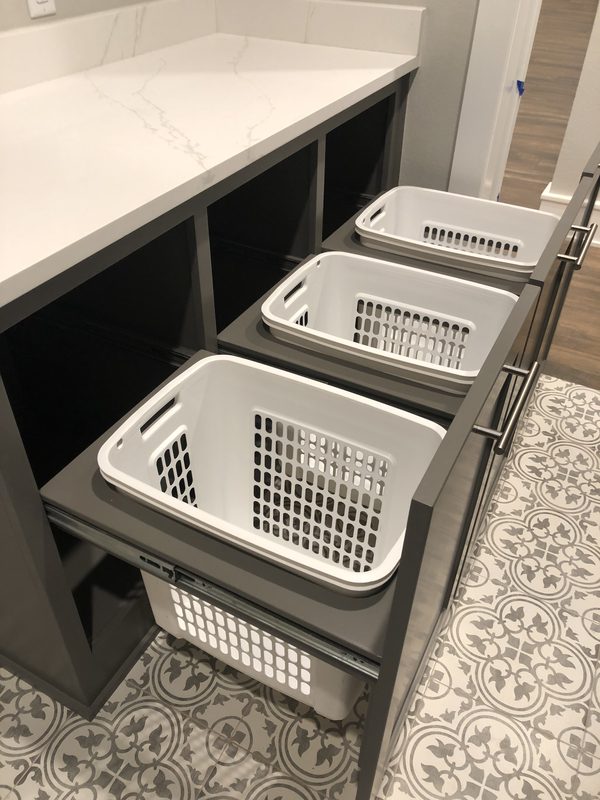 Custom laundry and mudroom cabinetry by Custom Wordworks in Longview, TX