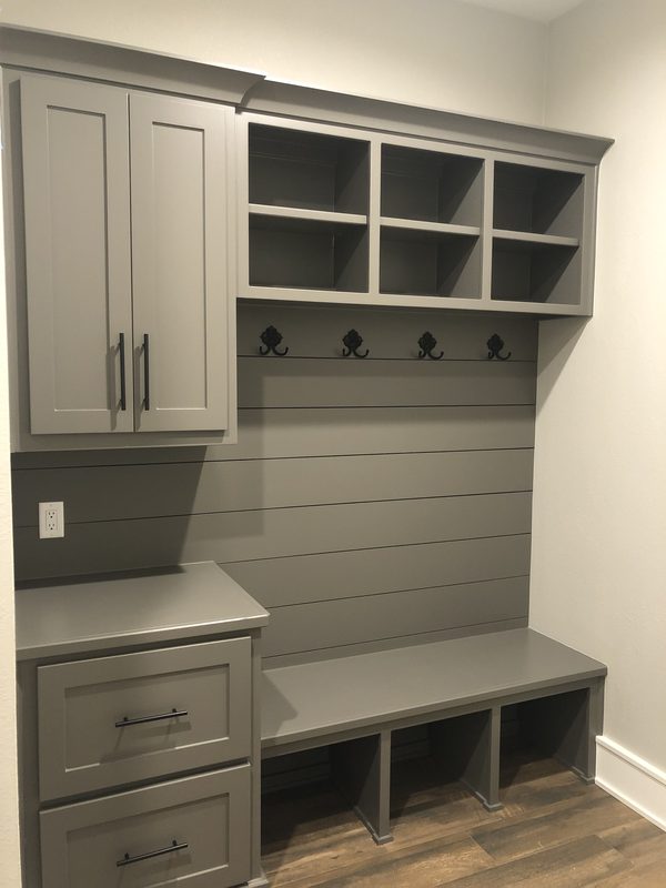 Custom laundry and mudroom cabinetry by Custom Wordworks in Longview, TX